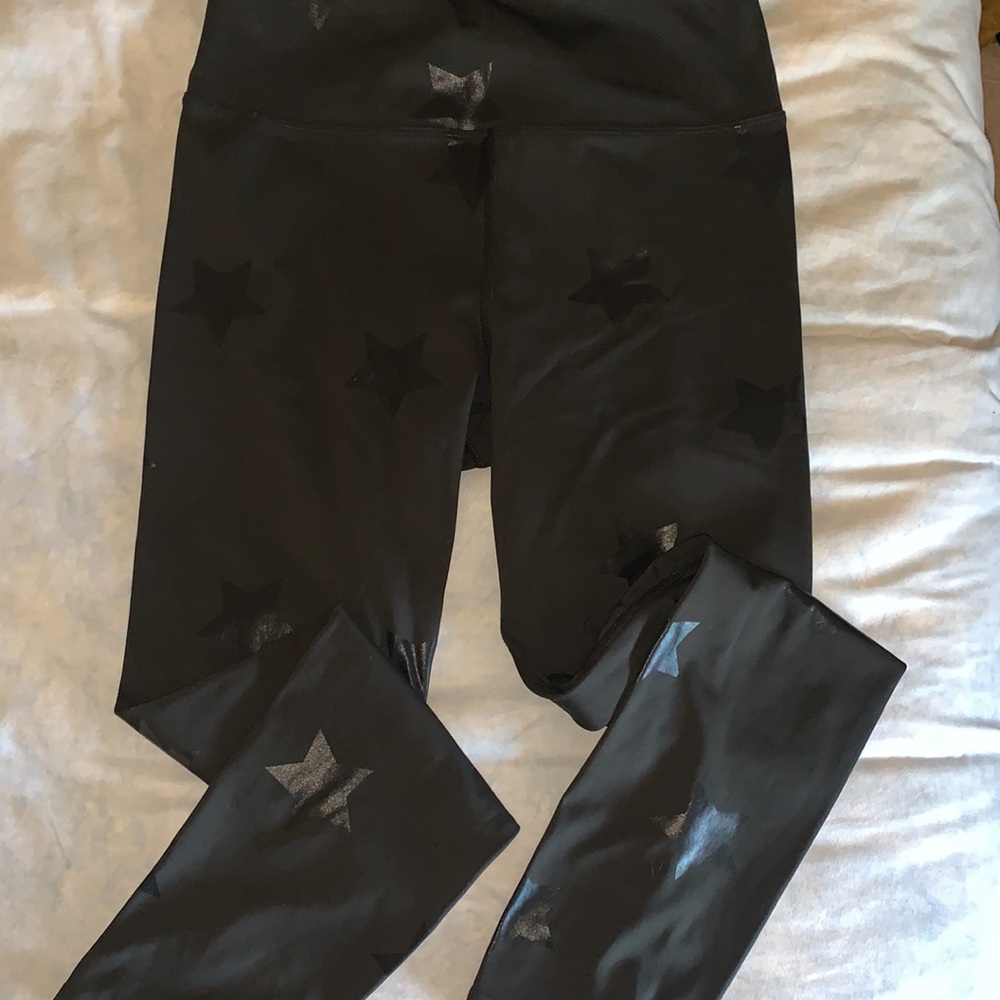 Black leggings with star details